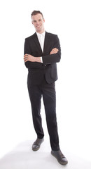 Young businessman standing isolated on white background