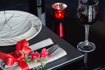Table place setting with holidays decoration.