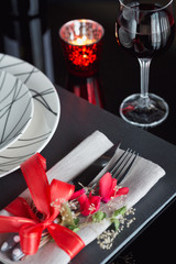 Table place setting with holidays decoration.