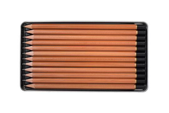 New wooden pencils in metal box tin isolated - Powered by Adobe