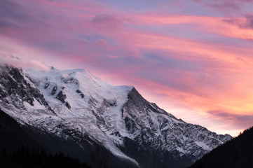 Fototapeta na wymiar Cloud cover over Massif Mont Blanc illumated by sunset