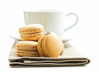 Coffee macarons and coffee cup.