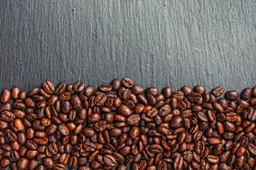 Coffee cup, spices and chocolate on wooden table texture with co