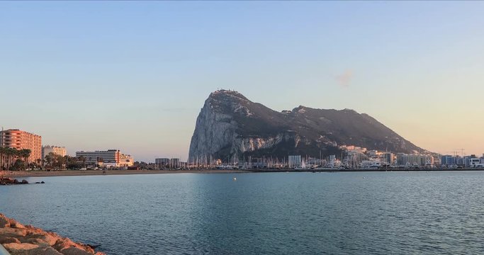Zoom in view on Gibraltar rock from La Linea city in the evening, Andalusia, Spain
