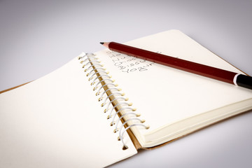 shopping list in the diary with pencil