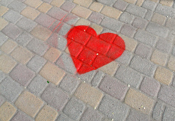 Picture of red heart on the paving tile