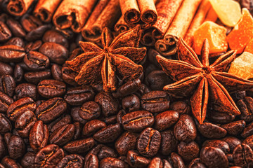 Coffee cup, spices and chocolate on wooden table texture with co