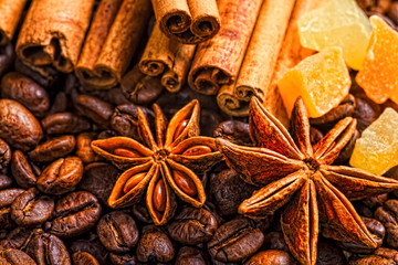 Coffee cup, spices and chocolate on wooden table texture with co