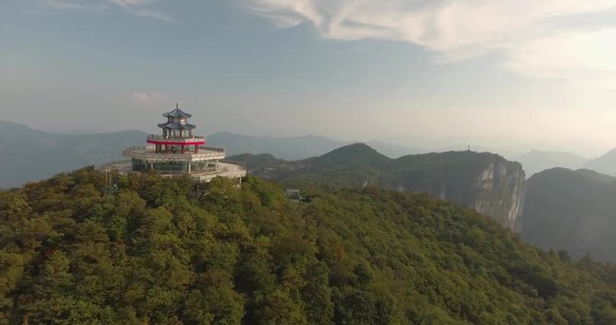 Beautiful aerial shot of oriental Tianmen shan temple on top of Tianmen mountain in Zhangjiajie city hunan province China. Top view of famous Tianmen Mountain National Park.
