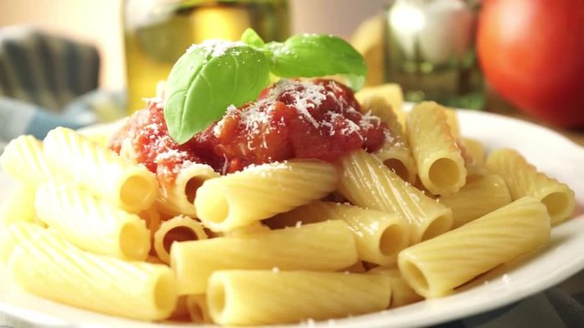 dish with macaroni and tomato sauce