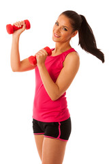 Active young woman workout with dumbbells in fitness gym isolate