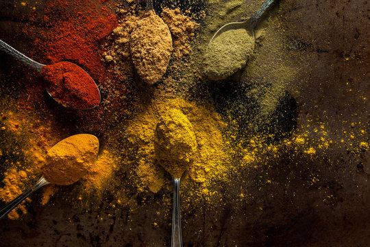 Spilling Spices in Spoons