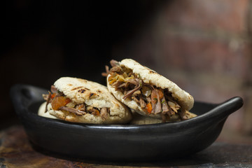 Colombian arepa filled with shredded beef