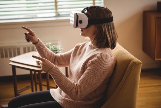 Woman using vr-headset glasses