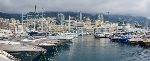 The Principality of Monaco - July, 2016: Monte Carlo harbour city panorama. View of luxury yachts and apartments in harbor of Monaco, Cote d'Azur.