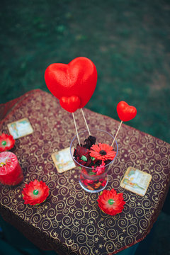 valentine day decor.love story. decorated table ,hearts , romantic dinner outside