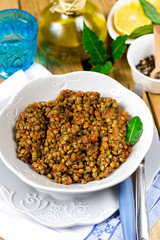 Lentil stew in tomato sauce with cinnamon and spices