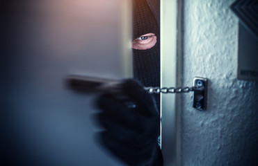 burglar open door of apartment or house