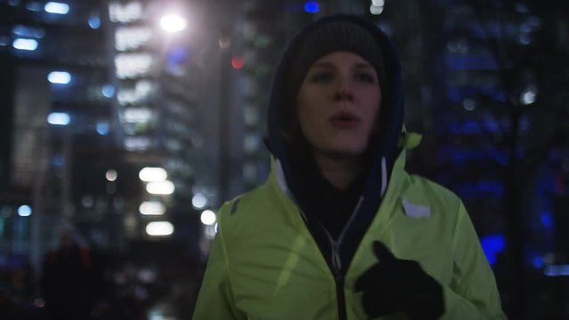 4K Female Jogger In The City At Night, In Slow Motion