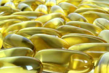 Fototapeta na wymiar abstract of fish oil capsules