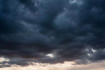 Naklejka na ściany i meble Dark sky ominous grey storm clouds