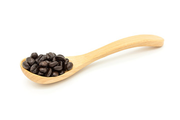 coffee beans in wooden spoon