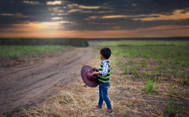 boy watching beautiful sunset