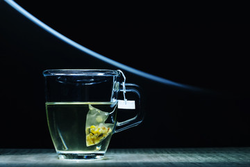 A glass of tea and light