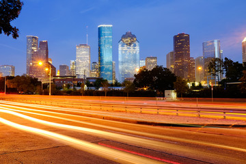 Fototapeta na wymiar Houston Downtown at night, with light trail, blue sky