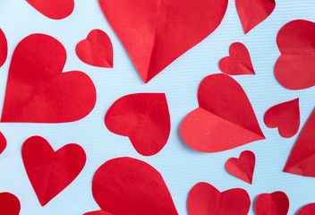 red heart shape paper on white background