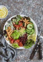 Crunchy taco vegetables salad bowl. Delicious food, top view