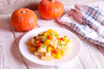 cooked vegetables on a white plate