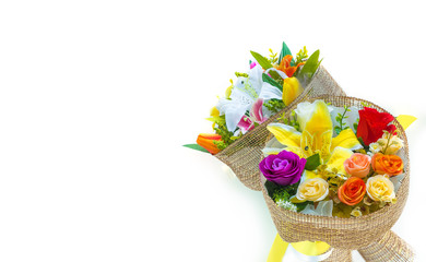 The bouquets of artificial flowers on white background