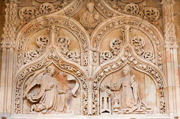 Fototapeta na wymiar SALAMANCA, SPAIN, APRIL - 17, 2016: The Annunciation as the detail from gothic portal of romanesque church Iglesia de San Benito.