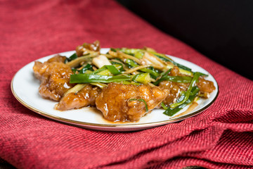 wok fried chicken stir fry with sweet peppers and chinese vegeta