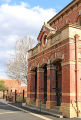 Fototapeta na wymiar DUNOLLY, VICTORIA, AUSTRALIA - September 19, 2015: The Venetian Gothic Town Hall was originally constructed in 1884 as the Court House during Dunollys Gold Rush days. It became the Town Hall in 1887