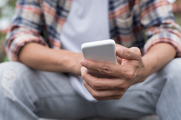 Young man using mobile smartphone