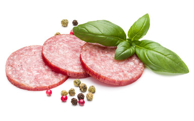Salami smoked sausage three slices, basil leaves and peppercorns