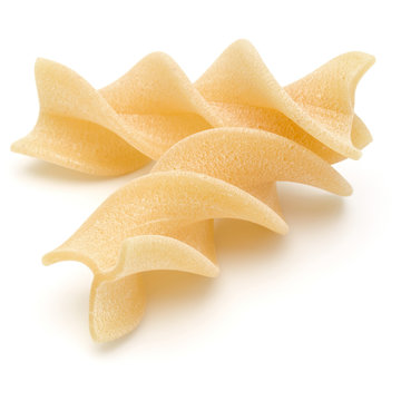 Italian  twisted pasta fusilli isolated on white background. Fus