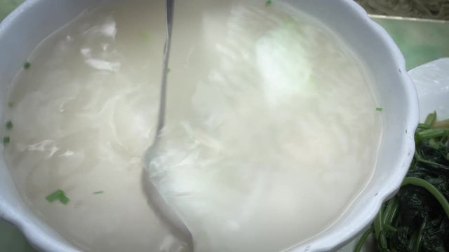 Chinese soup dish with mussels in China restaurant