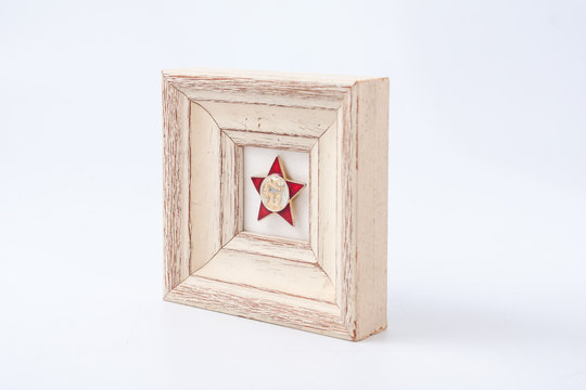 Octobrist icon in the frame.