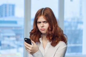frustrated woman with mobile phone