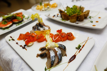beautiful and tasty food on a plate on a wooden table