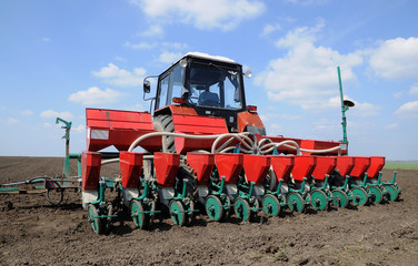 On the tractor with precision seeder