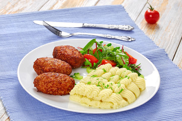 cutlets, fresh healthy salad and mashed potato