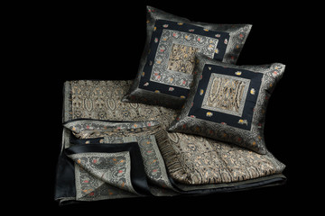 home  linens and pillows on a black background
