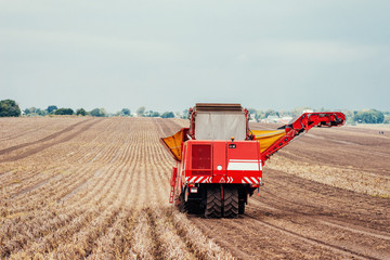 Obraz premium tractors working in the field