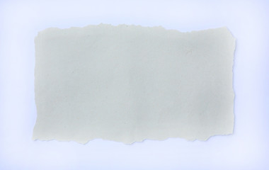 Gray torn paper on white background