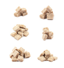 Pile of brown sugar cubes isolated