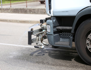 tank truck city street cleaning with powerful water jet